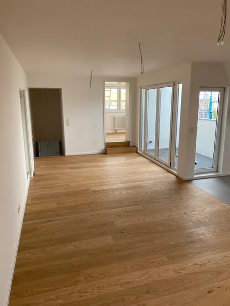 Wohnen und Arbeiten in moderner neuer 4-Zimmer Dachgeschosswohnung! — photo 1